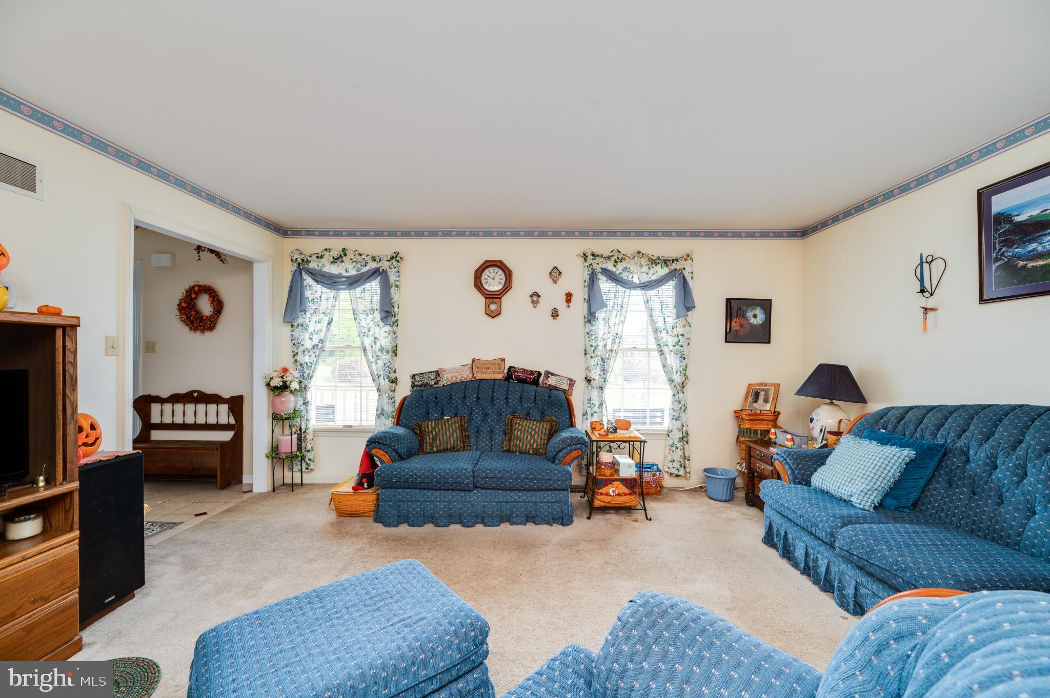 1052 Boeshore Circle Reading, PA 19605 - Photo 25 of 72 a living room with furniture and a flat screen tv