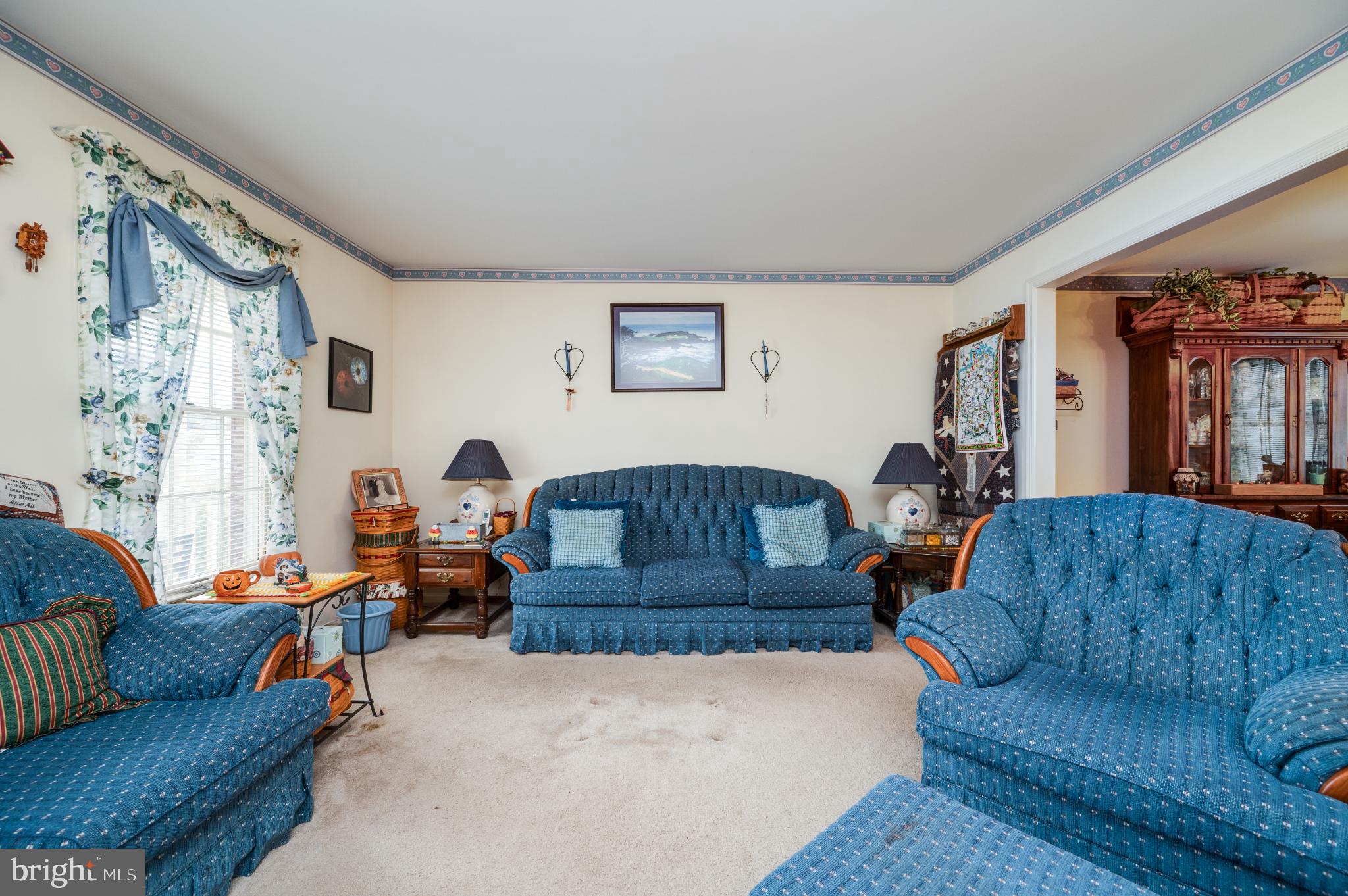1052 Boeshore Circle Reading, PA 19605 - Photo 26 of 72 a living room with furniture a couch and a window