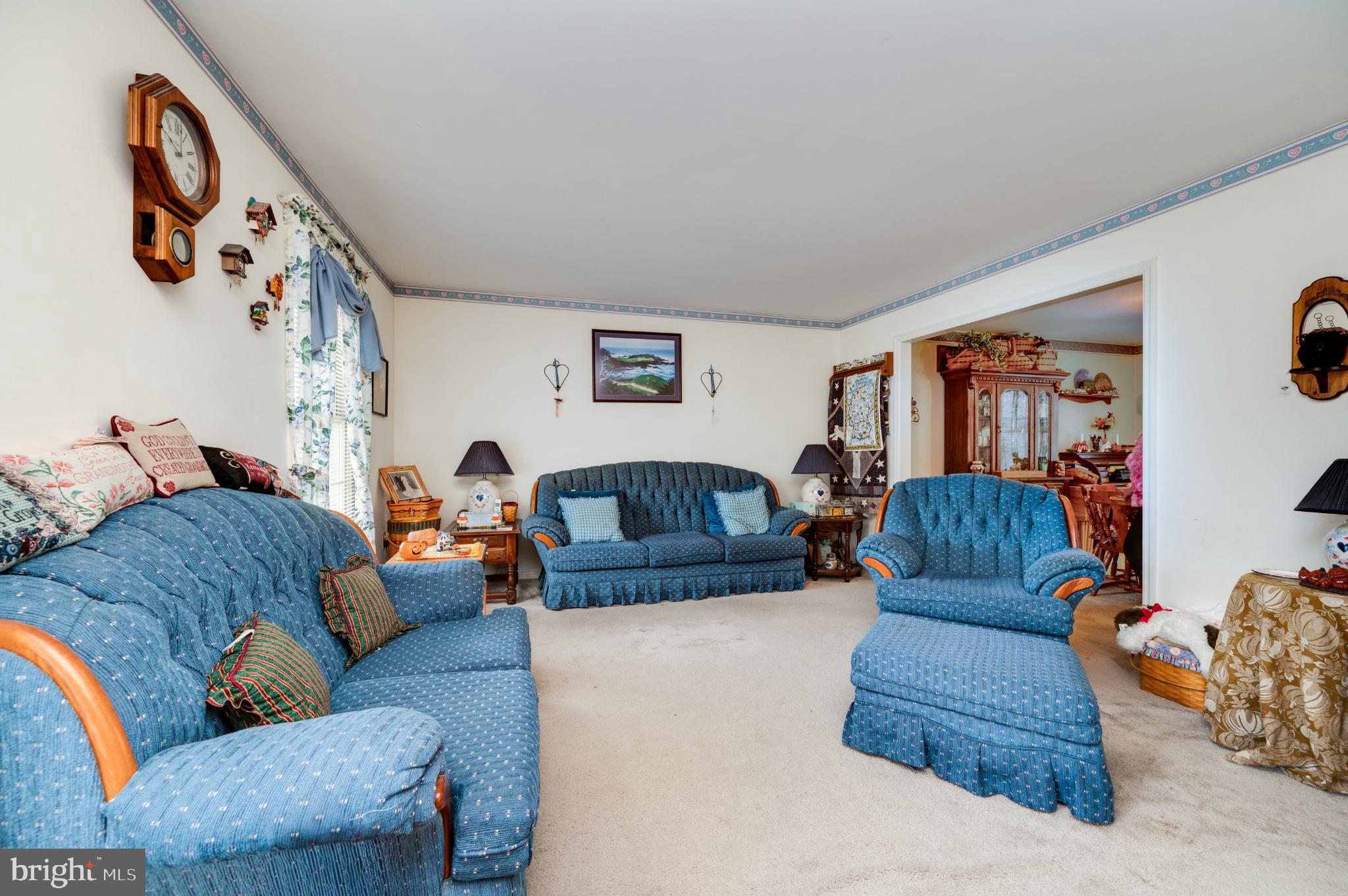 1052 Boeshore Circle Reading, PA 19605 - Photo 27 of 72 a living room with furniture and a large window