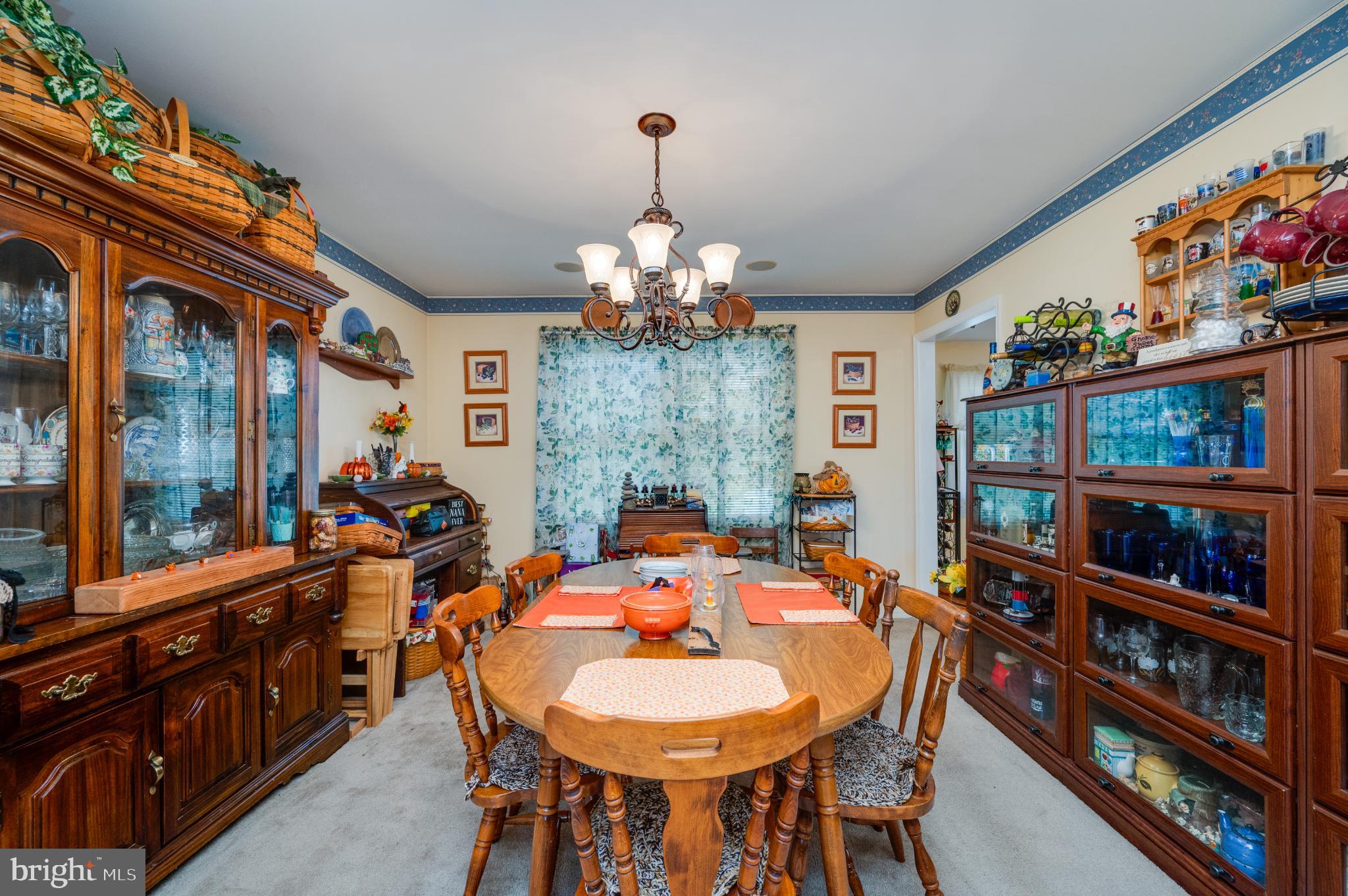 1052 Boeshore Circle Reading, PA 19605 - Photo 29 of 72 a very nice looking dining room with furniture and a chandelier