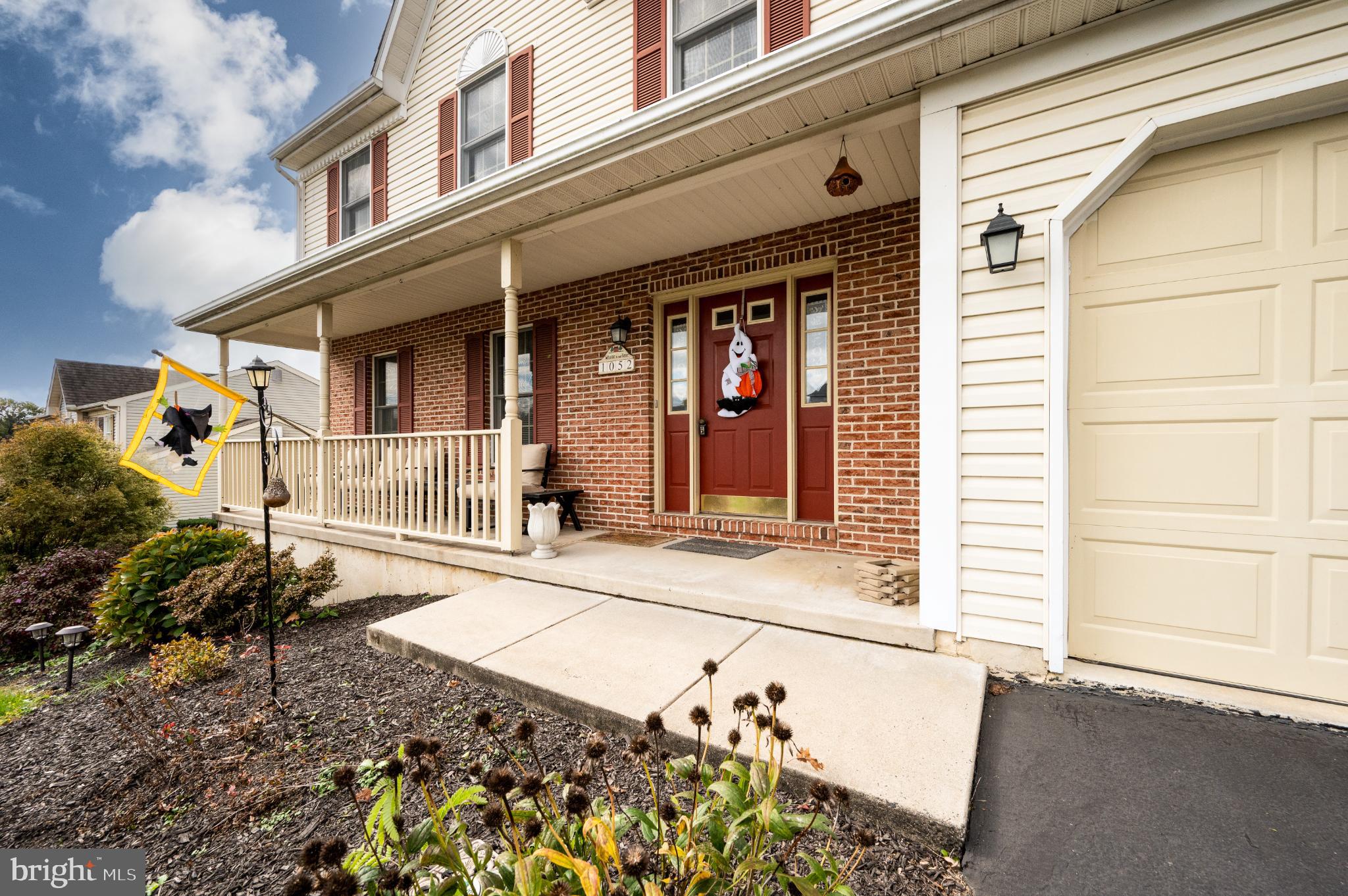 1052 Boeshore Circle Reading, PA 19605 - Photo 5 of 72 Charming entrance with inviting porch appeal.