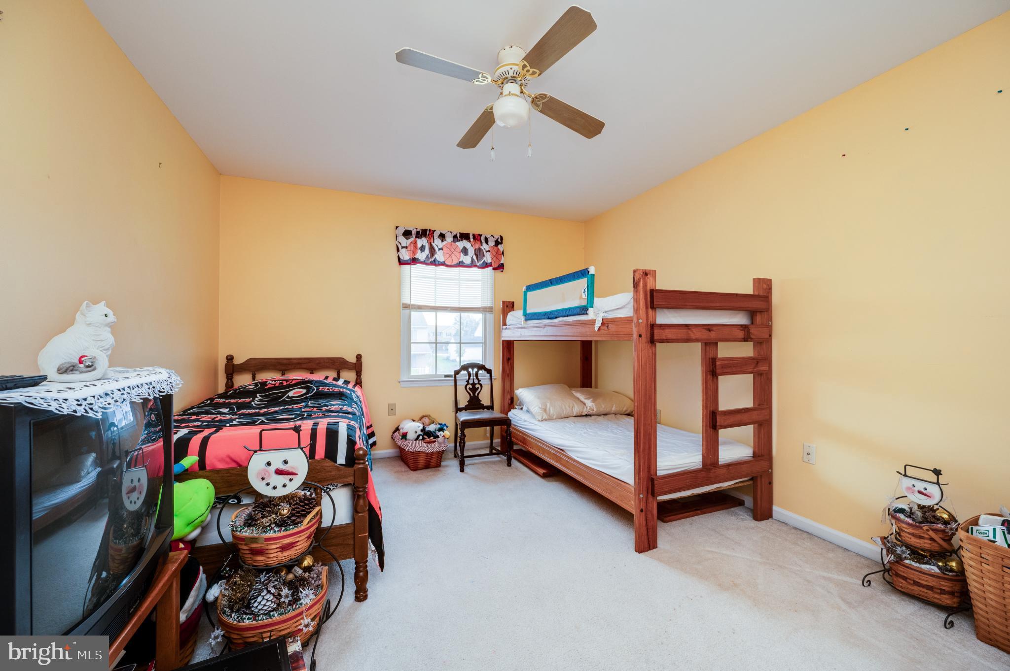 1052 Boeshore Circle Reading, PA 19605 - Photo 61 of 72 a bedroom with bed and a baby crib