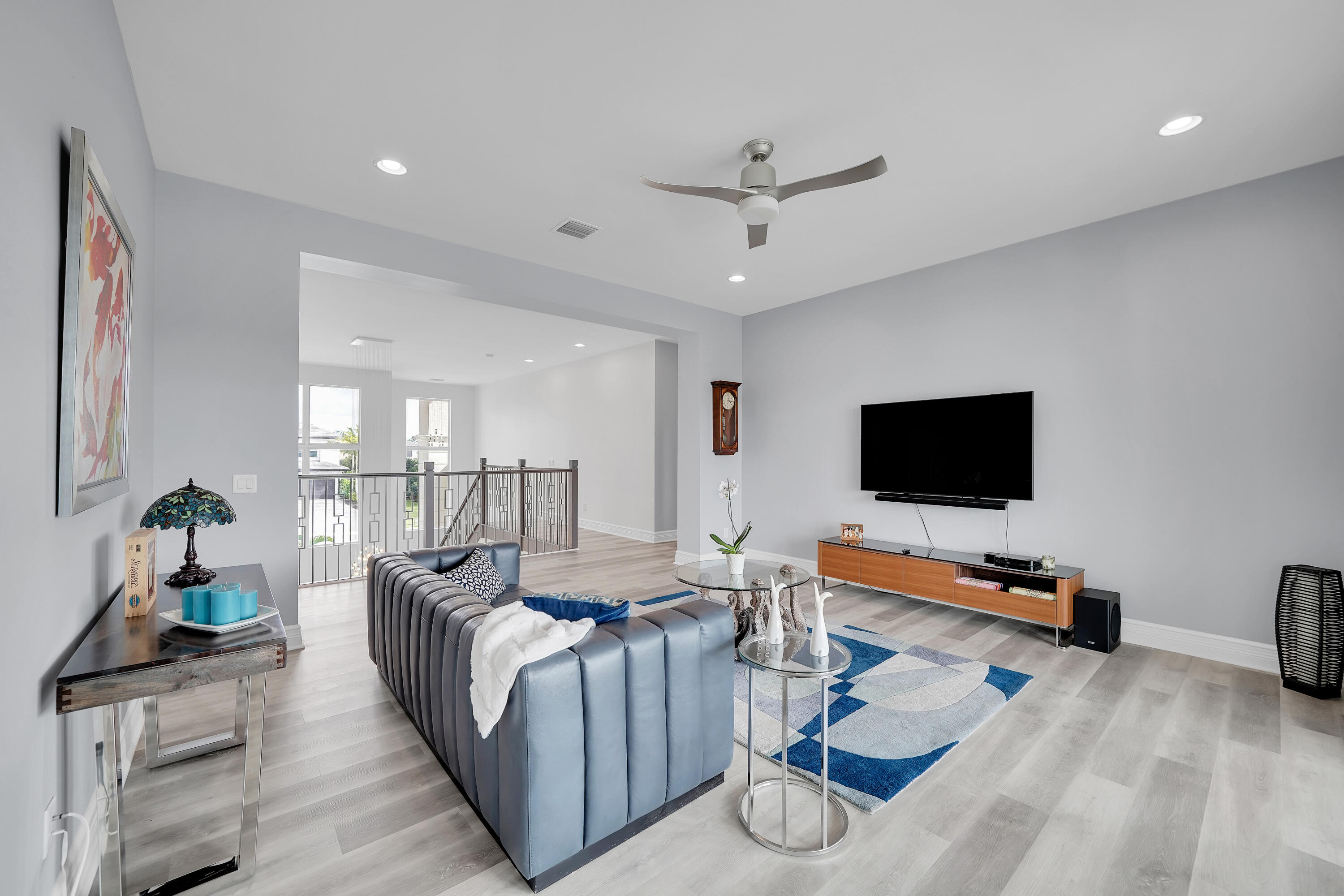 19871 Meadowside Lane Boca Raton, FL 33498 - Photo 33 of 102 a living room with furniture and a flat screen tv