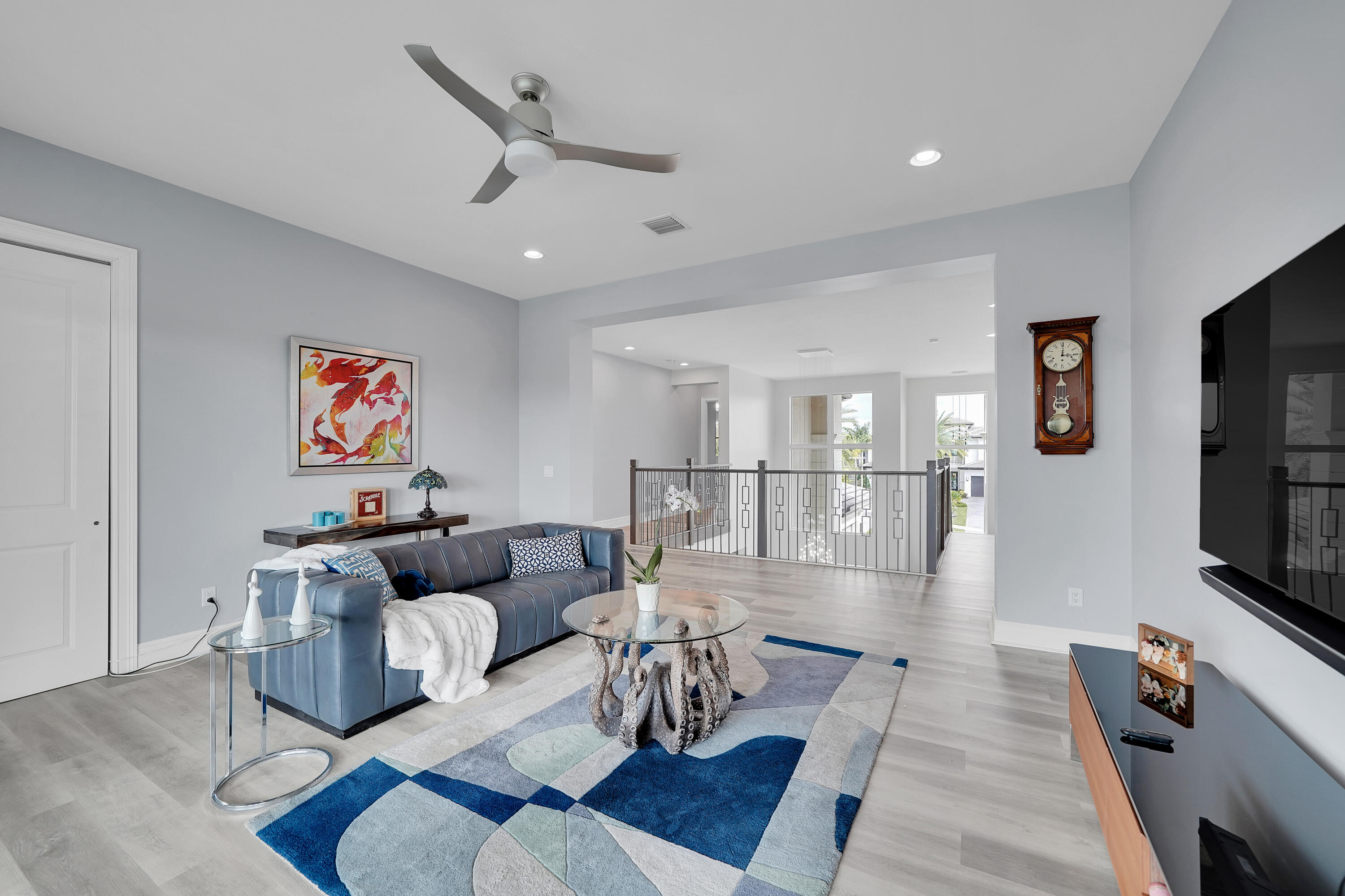 19871 Meadowside Lane Boca Raton, FL 33498 - Photo 34 of 102 a living room with furniture and a flat screen tv