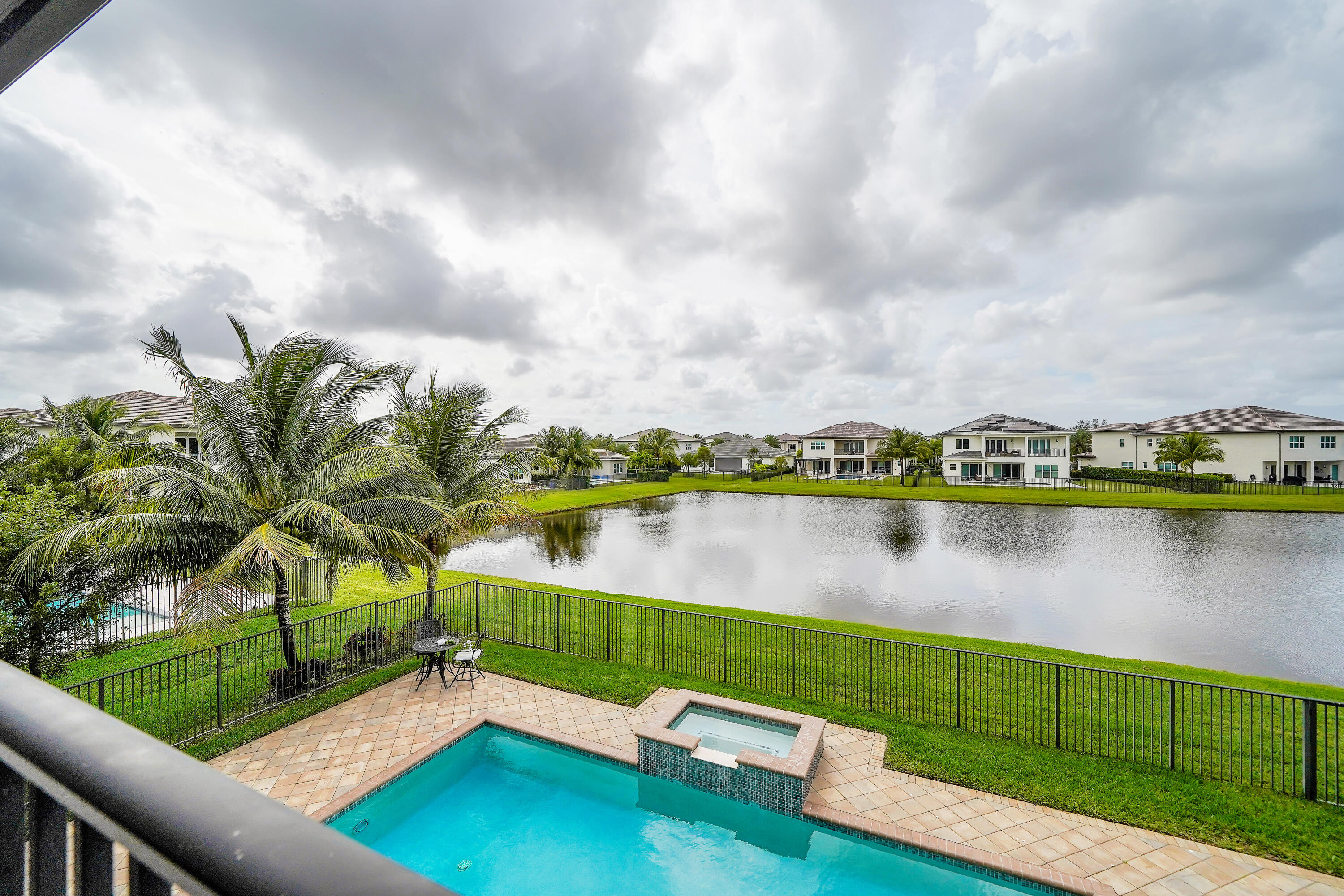 19871 Meadowside Lane Boca Raton, FL 33498 - Photo 80 of 102 a view of a lake with a city view