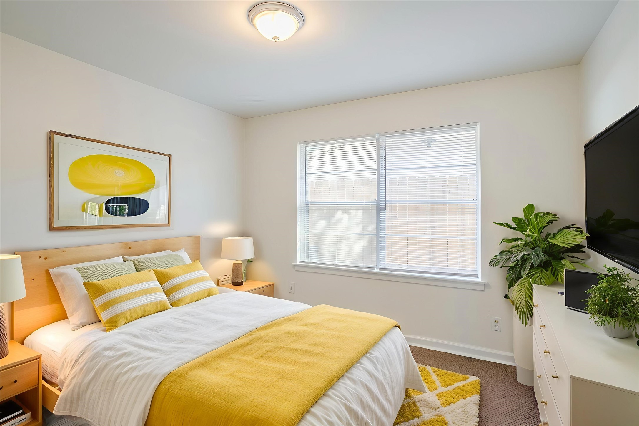 6434 Leader Street Houston, TX 77074 - Photo 13 of 46 a bedroom with a bed and a window