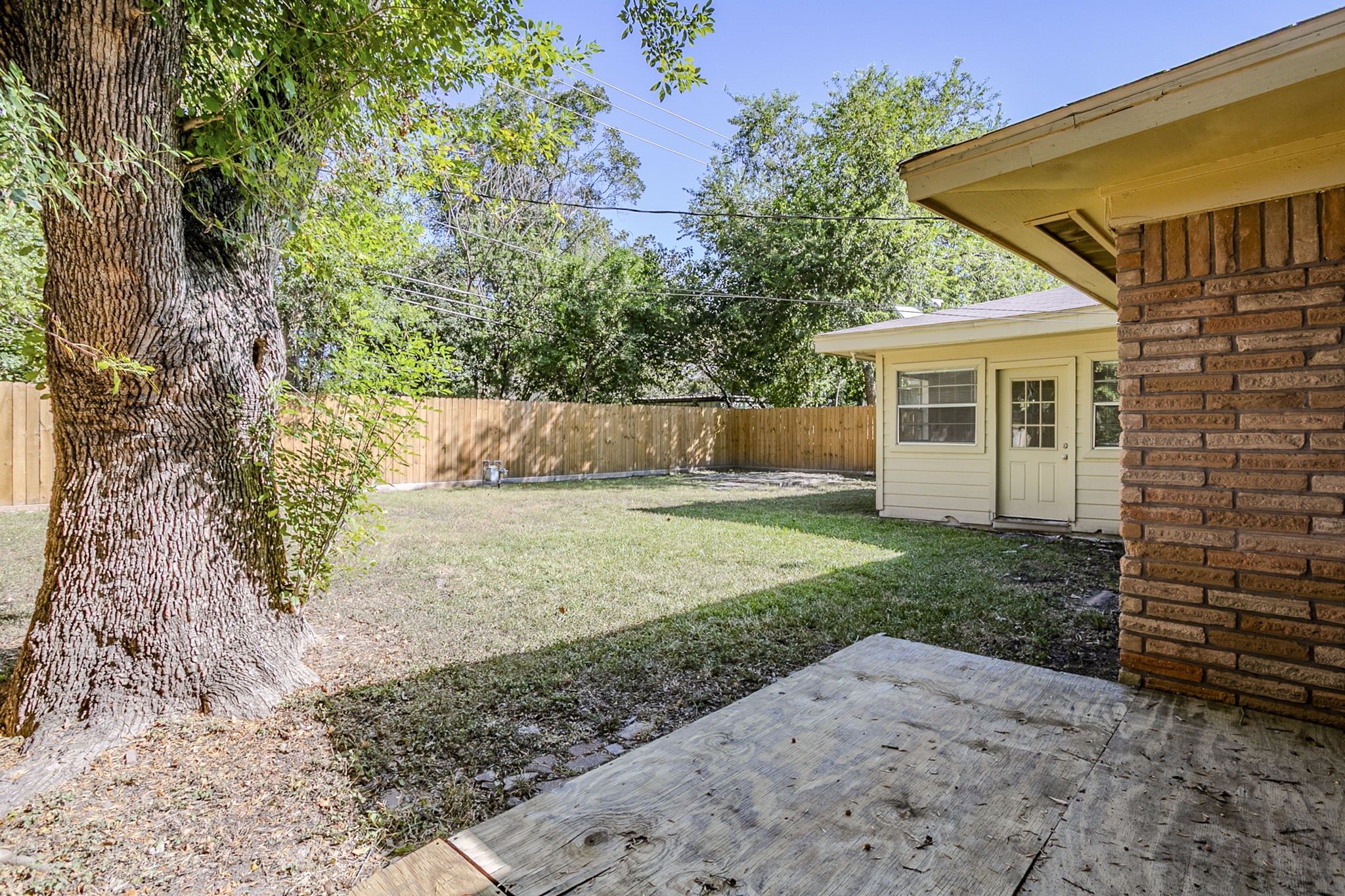 6434 Leader Street Houston, TX 77074 - Photo 41 of 46 a view of a house with a yard