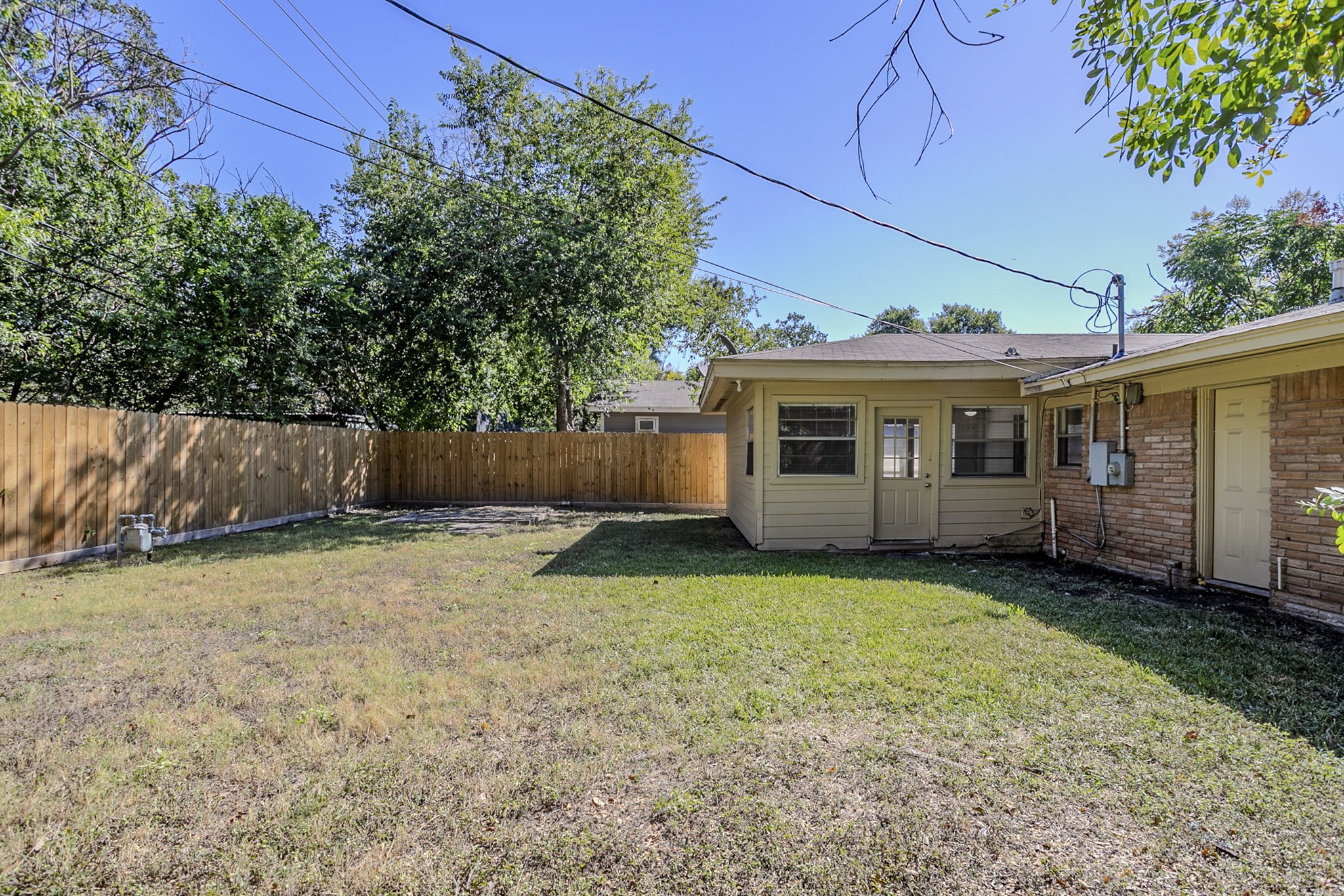 6434 Leader Street Houston, TX 77074 - Photo 42 of 46 a view of a house with a yard