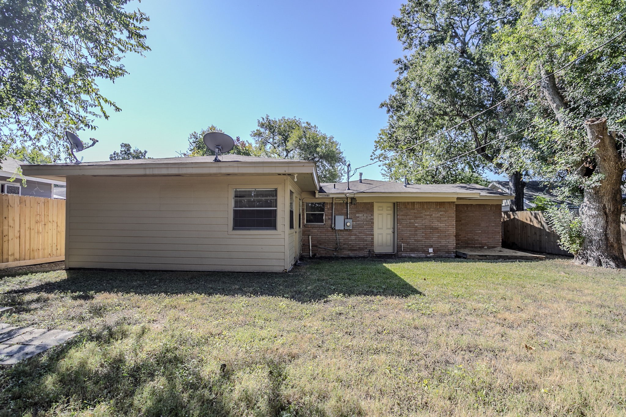 6434 Leader Street Houston, TX 77074 - Photo 43 of 46 a view of a house with a yard