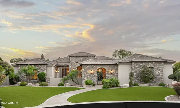 front view of a house with a yard