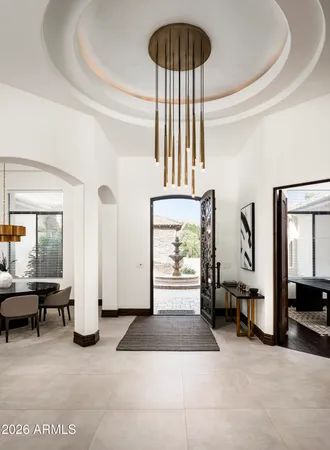 a kitchen with stainless steel appliances granite countertop a stove and a refrigerator