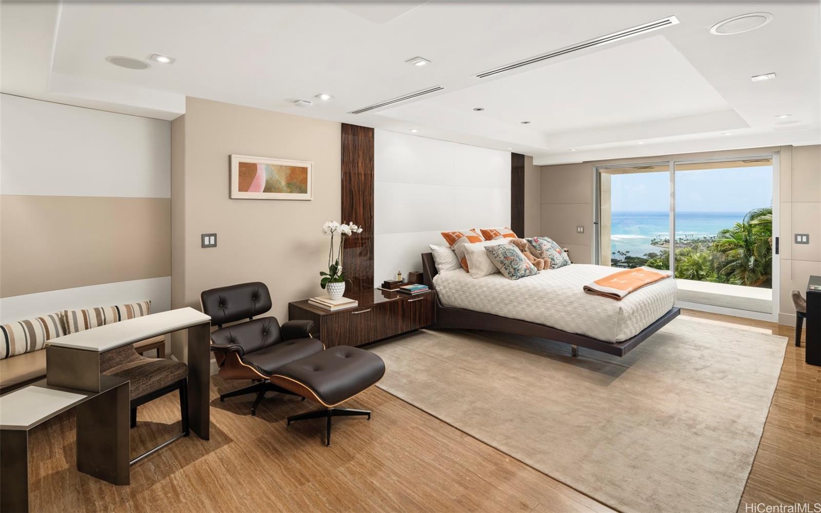 360 Puuikena Drive Honolulu, HI 96821 - Photo 19 of 24 a bedroom with a bed and a couch