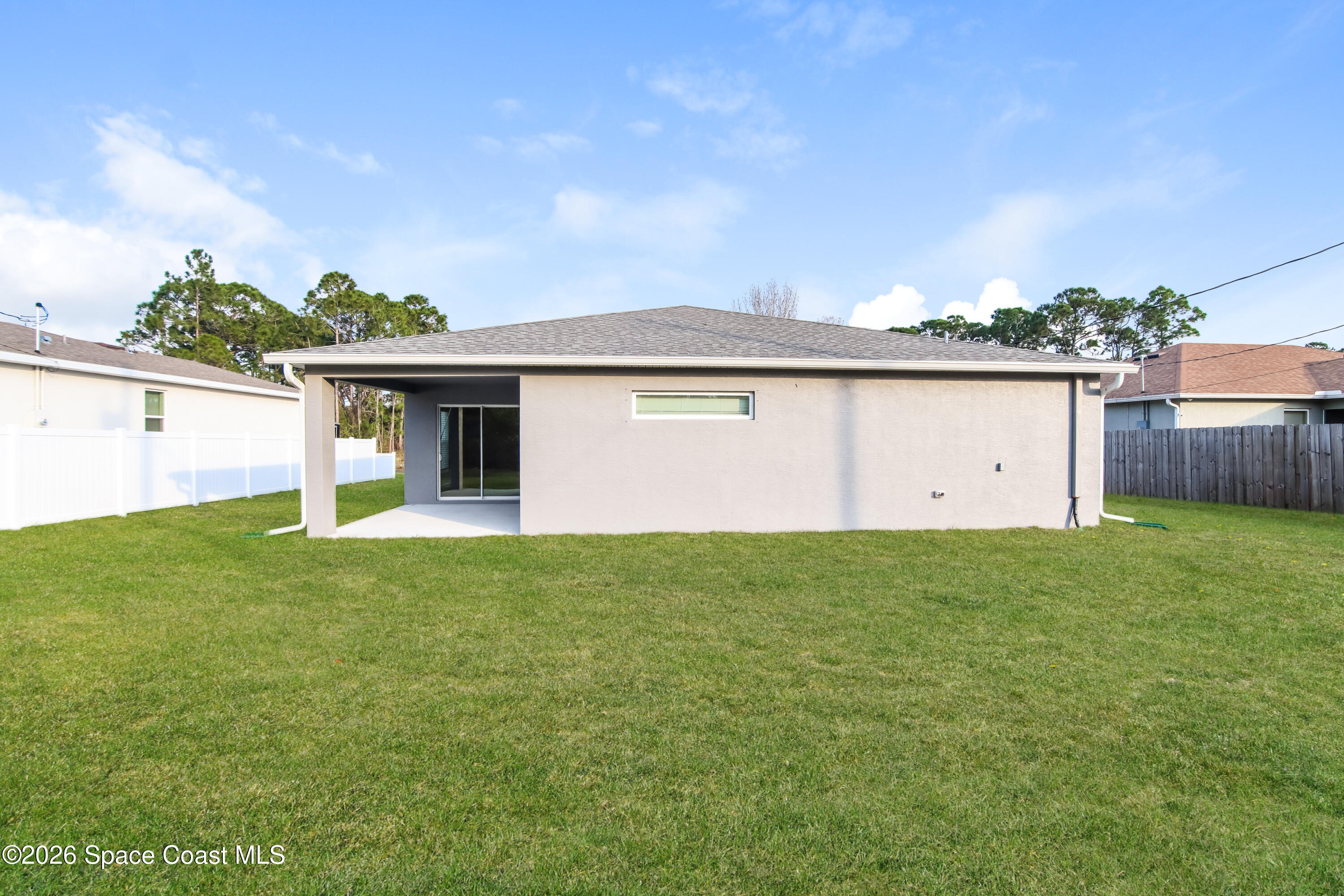 2110 Watkins Road Southeast Palm Bay, FL 32909 - Photo 14 of 15 1001399.2110 Watkins Road SE - Rear View