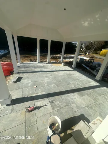 a picture of a glass window with a white wall