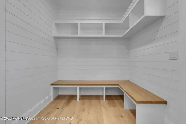 a view of room with racks on the wall