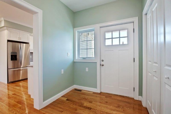 49 Tarbox Street Dedham, MA 02026 - Photo 17 of 30 a view of a room with wooden floor and closet