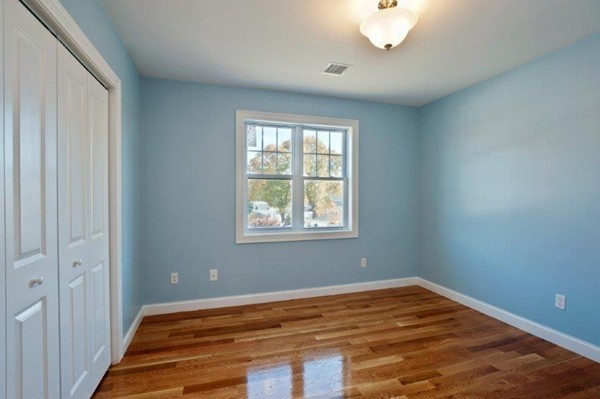 49 Tarbox Street Dedham, MA 02026 - Photo 23 of 30 a view of empty room with wooden floor