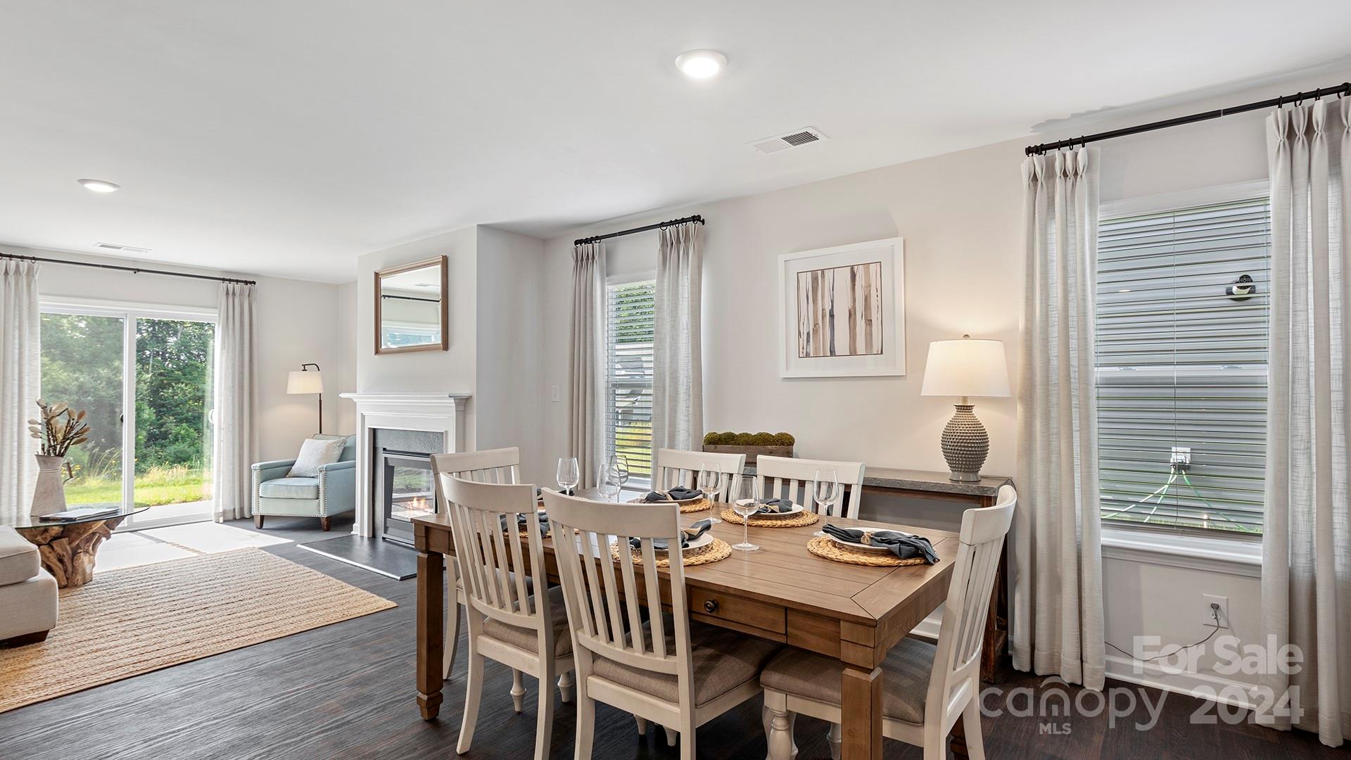 509 Jaca Lane Arden, NC 28704 - Photo 6 of 28 a dining room with furniture and window