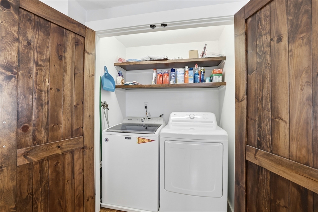 63 Bancroft Road Cohasset, MA 02025 - Photo 12 of 41 a view of storage and utility room with washer and dryer