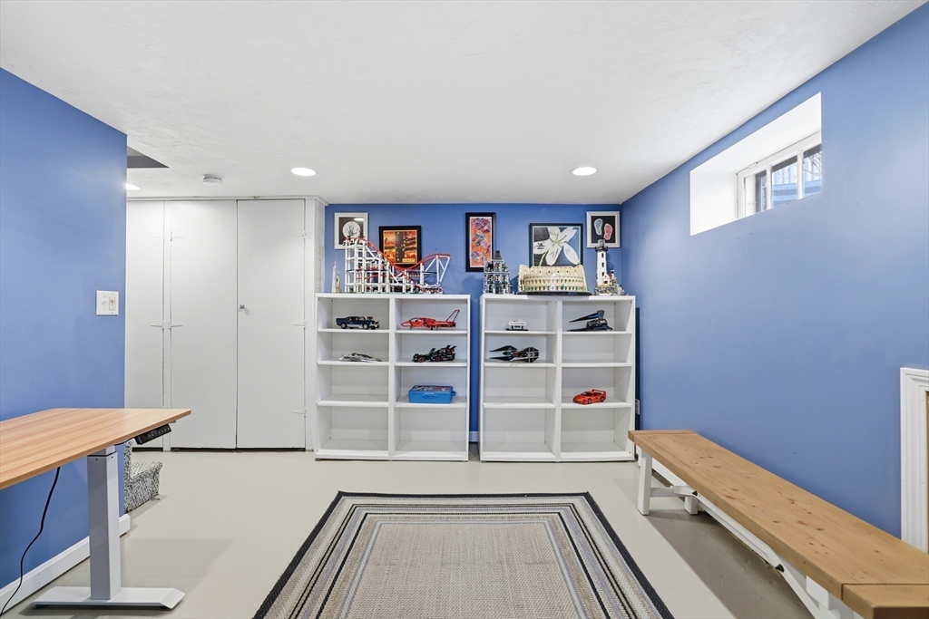 63 Bancroft Road Cohasset, MA 02025 - Photo 28 of 41 a view of empty room with shelves