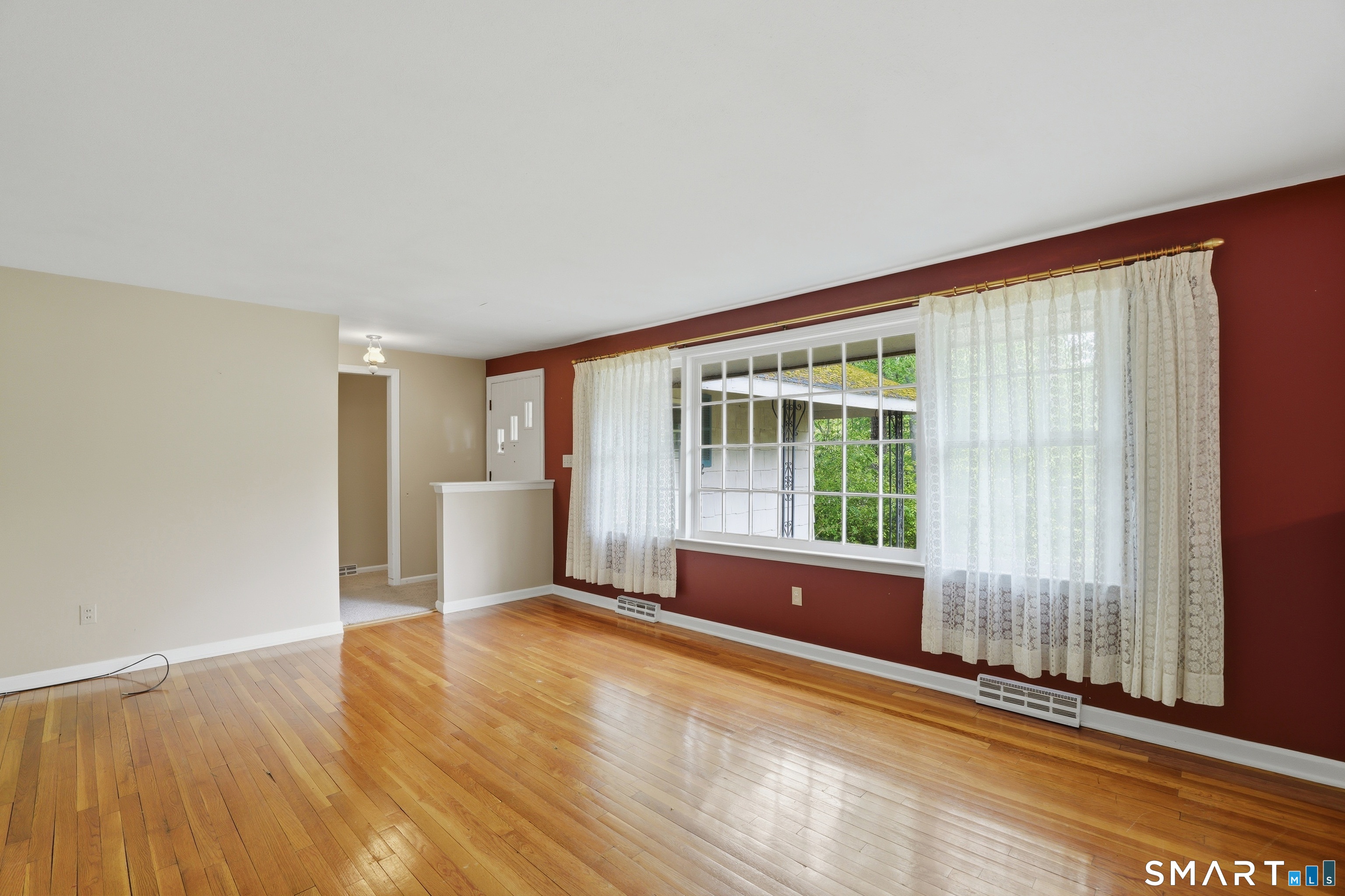 731 Still Hill Road Hamden, CT 06518 - Photo 6 of 40 a view of an empty room with a window