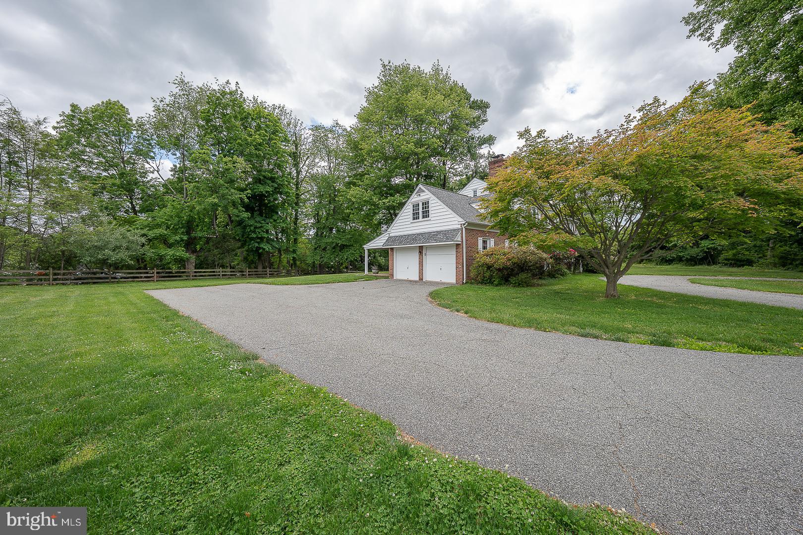 538 Conestoga Road Villanova, PA 19085 - Photo 35 of 39 a front view of a house with yard and green space