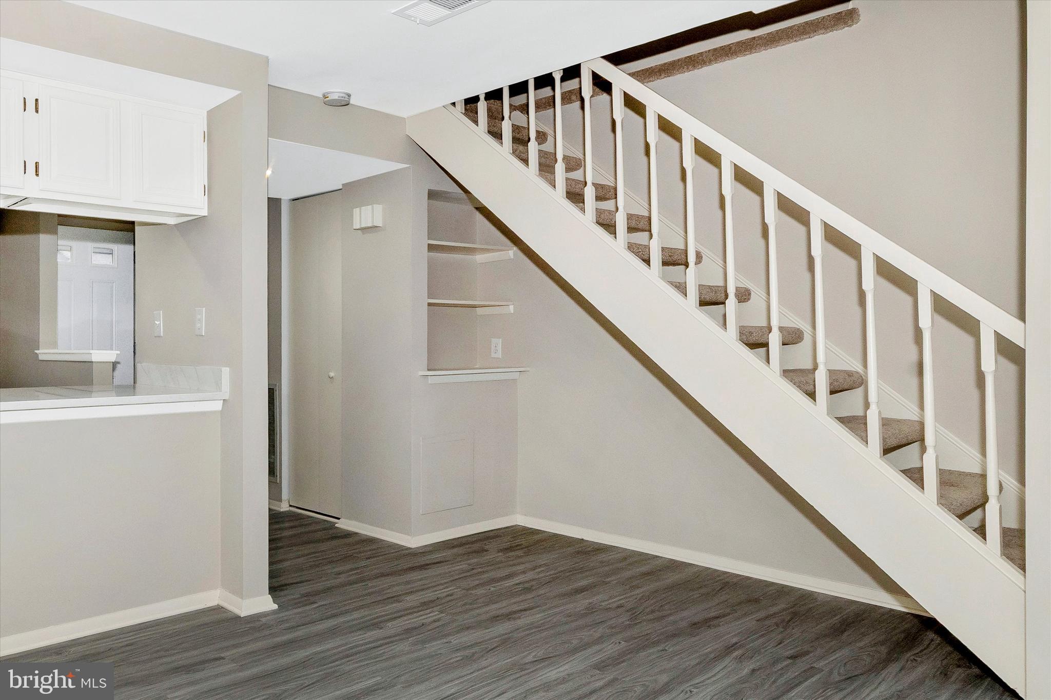 5818 Drawbridge Court Frederick, MD 21703 - Photo 16 of 40 Shelves under stairs, perfect for wine /coffee bar