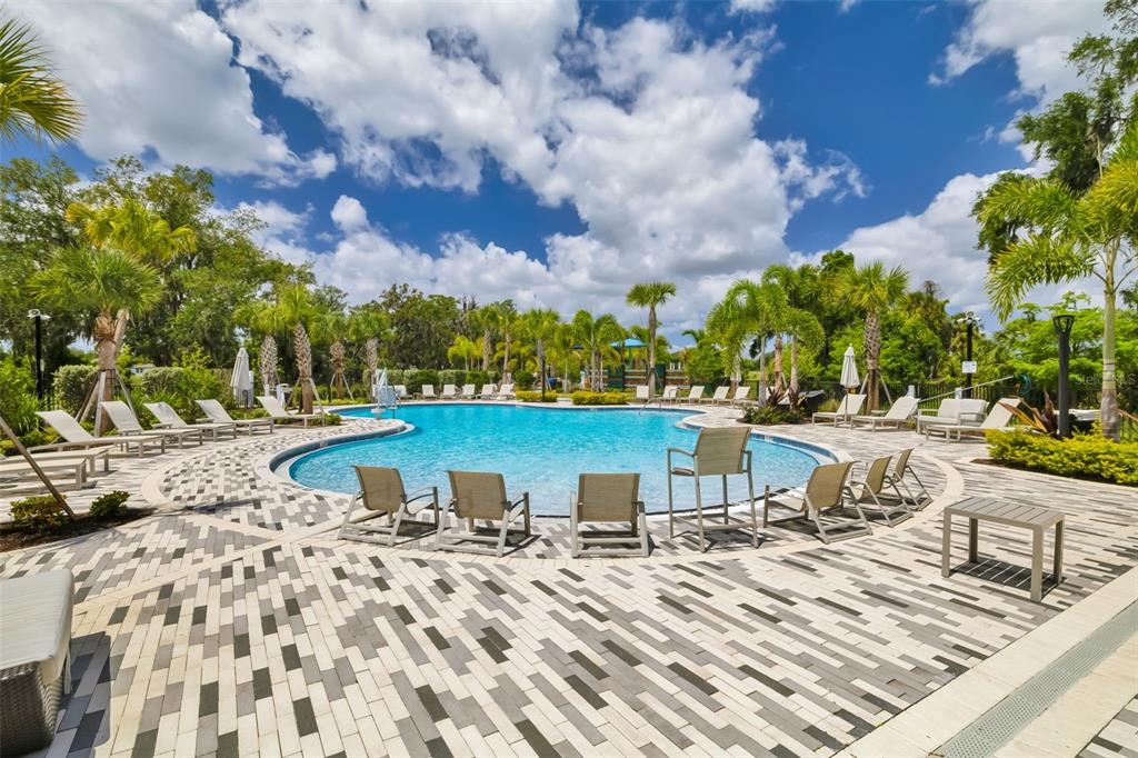 14086 Ginnie Spgs Way Parrish, FL 34219 - Photo 39 of 49 a view of a lake with a sitting area