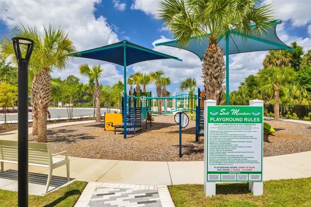 14086 Ginnie Spgs Way Parrish, FL 34219 - Photo 43 of 49 a view of a park with iron fence