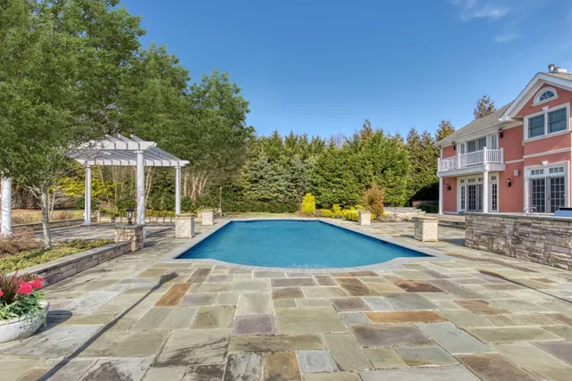 a view of pool with outdoor seating
