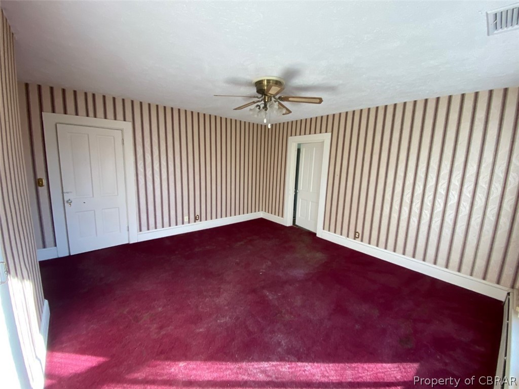 11044 Buckley Hall Road Mathews, VA 23109 - Photo 17 of 34 a view of an empty room with a window