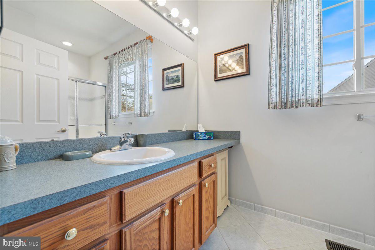901 Nathaniel Trail Warminster, PA 18974 - Photo 12 of 30 a bathroom with a sink and a mirror