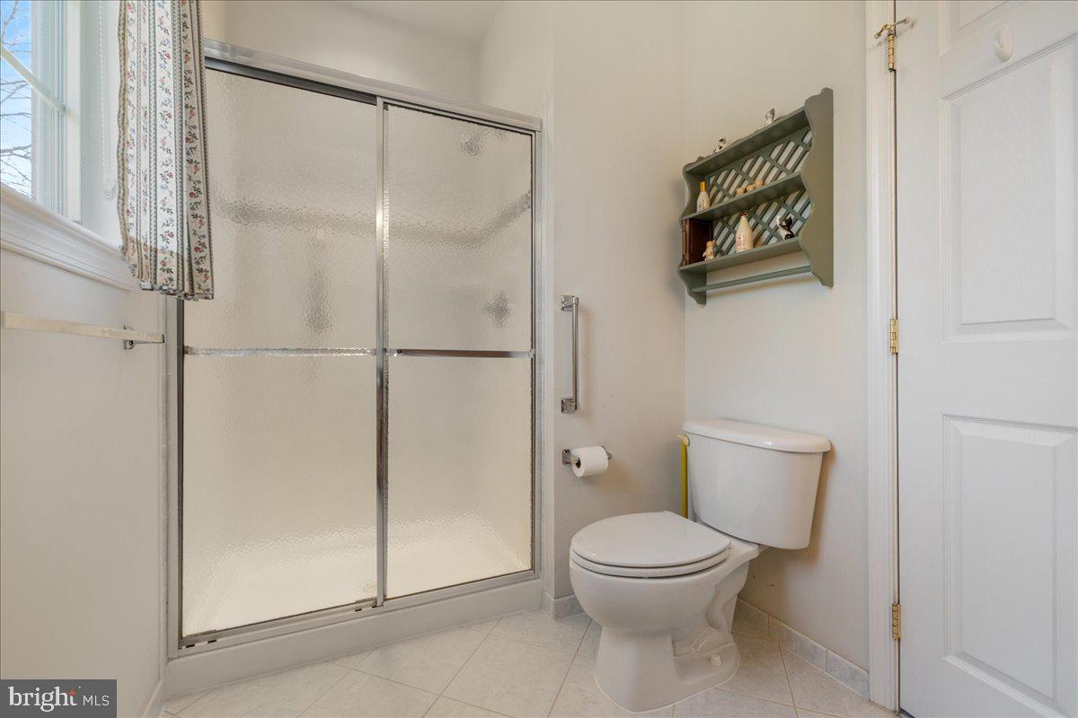 901 Nathaniel Trail Warminster, PA 18974 - Photo 13 of 30 a bathroom with a toilet and a shower