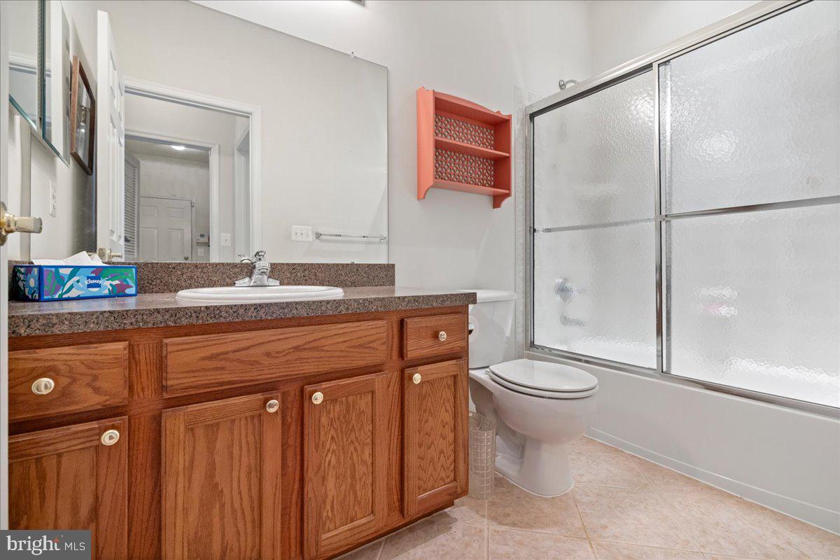 901 Nathaniel Trail Warminster, PA 18974 - Photo 16 of 30 a bathroom with a sink a toilet and shower
