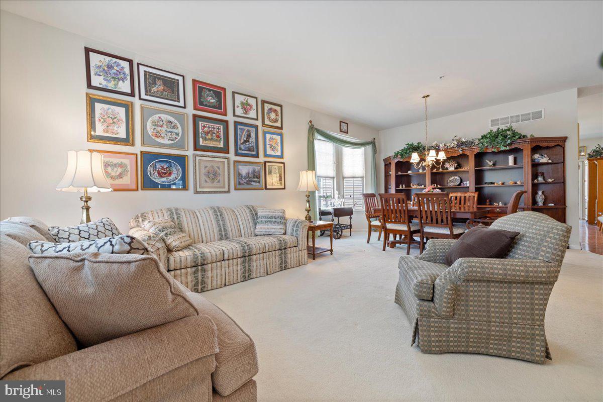901 Nathaniel Trail Warminster, PA 18974 - Photo 4 of 30 a living room with furniture and painting on the wall