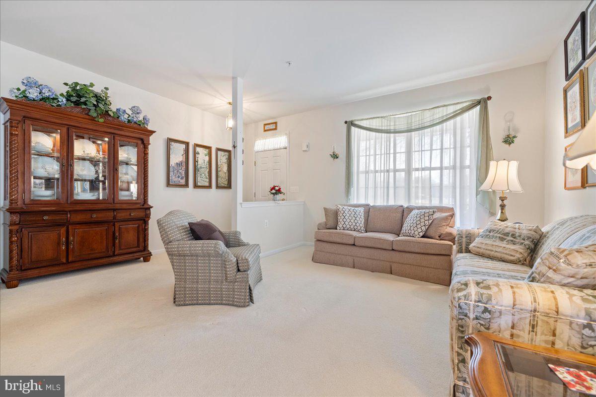 901 Nathaniel Trail Warminster, PA 18974 - Photo 5 of 30 a living room with furniture and a window