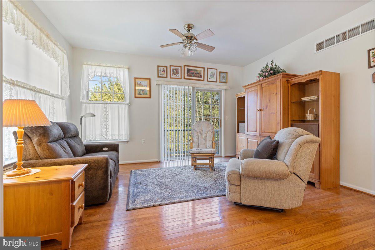 901 Nathaniel Trail Warminster, PA 18974 - Photo 8 of 30 a living room with furniture and a large window