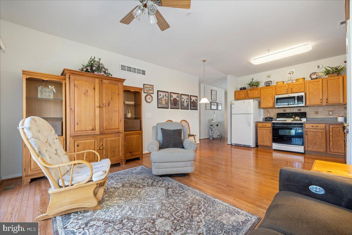 901 Nathaniel Trail Warminster, PA 18974 - Photo 9 of 30 a living room with furniture and a flat screen tv