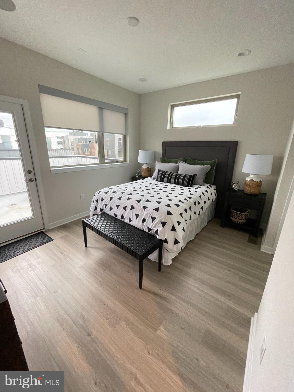 3125 Beachview Lane Philadelphia, PA 19125 - Photo 29 of 37 a bedroom with a bed and wooden floor