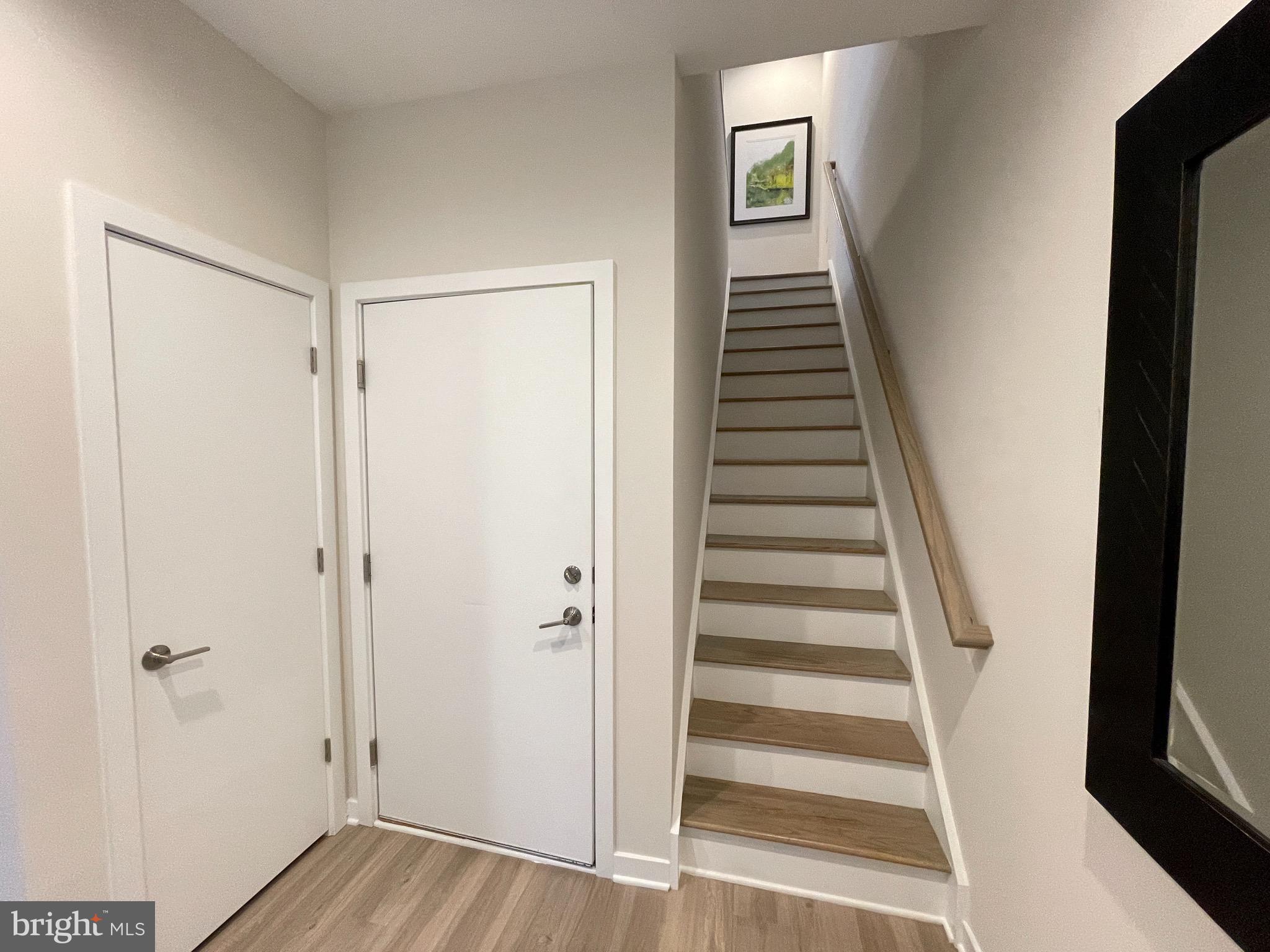 3125 Beachview Lane Philadelphia, PA 19125 - Photo 8 of 37 a view of a hallway with wooden floor and entryway