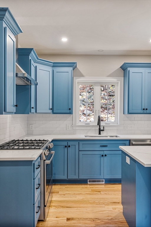 60 Wesson Street Grafton, MA 01536 - Photo 14 of 42 a kitchen with stainless steel appliances granite countertop a sink stove and cabinets
