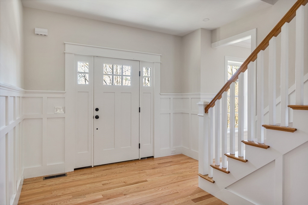 60 Wesson Street Grafton, MA 01536 - Photo 2 of 42 a view of entryway with wooden floor and stairs