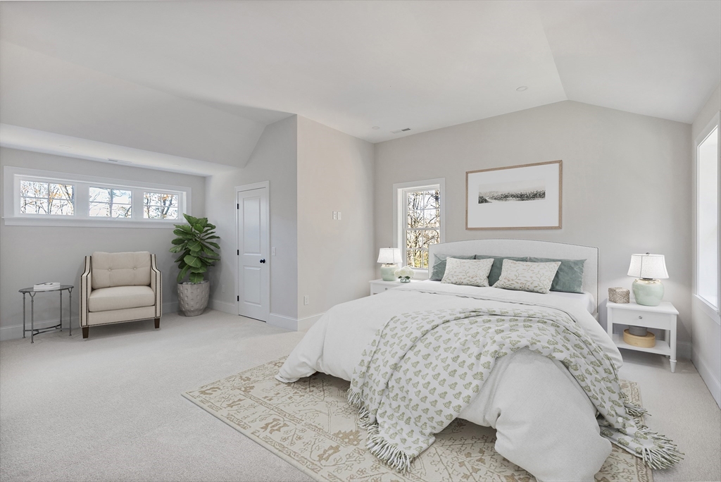 60 Wesson Street Grafton, MA 01536 - Photo 22 of 42 a spacious bedroom with a bed and a couch