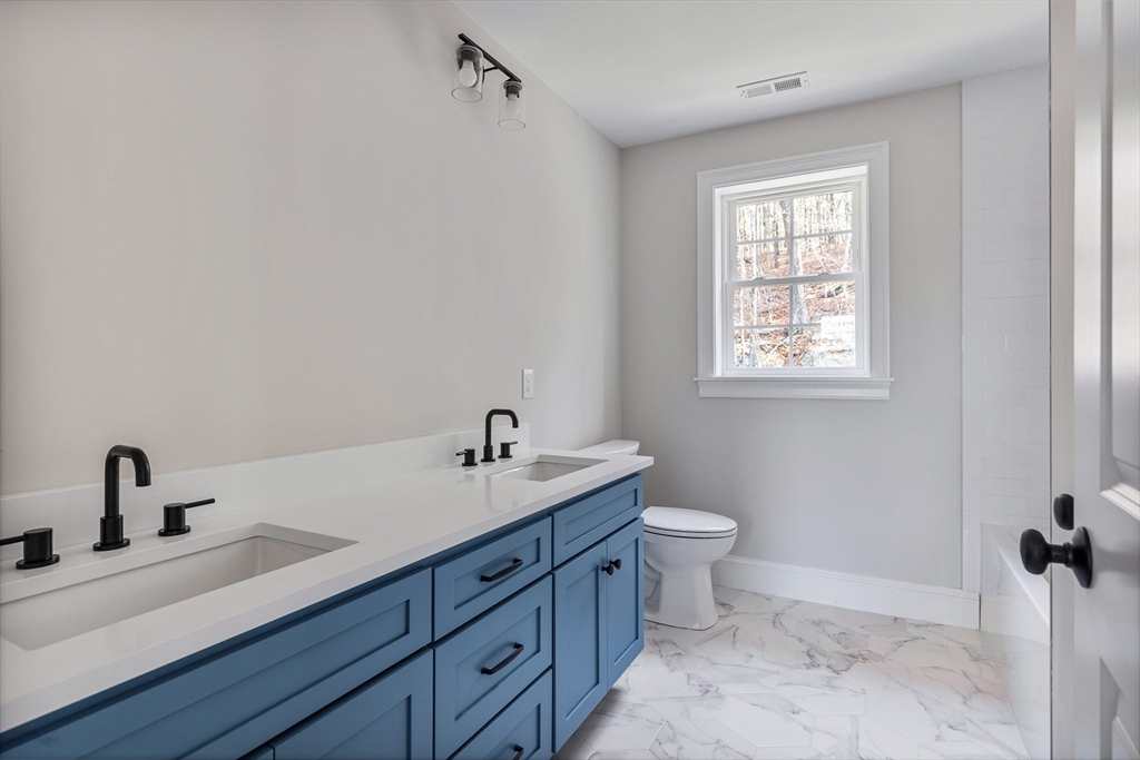 60 Wesson Street Grafton, MA 01536 - Photo 29 of 42 a bathroom with a sink and a toilet