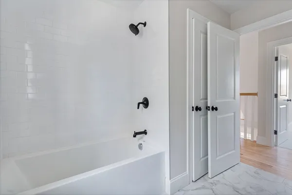 a bathroom with a bathtub
