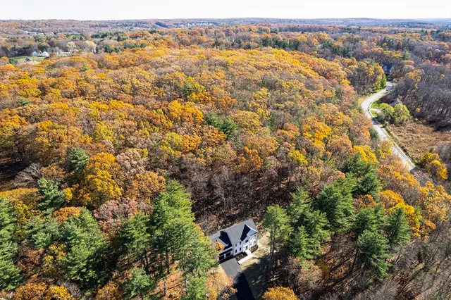 an aerial view of residential house with parking space