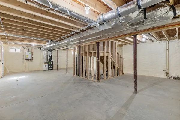 a view of a room with wooden ceiling