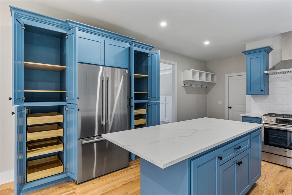 60 Wesson Street Grafton, MA 01536 - Photo 9 of 42 a kitchen with a refrigerator and a sink