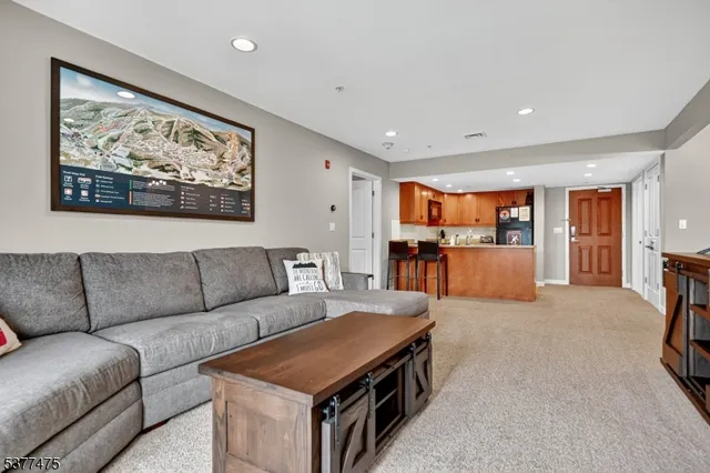 a bedroom with a bed and a furniture