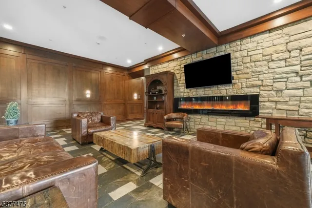 a kitchen that has a microwave a sink and a stove in it